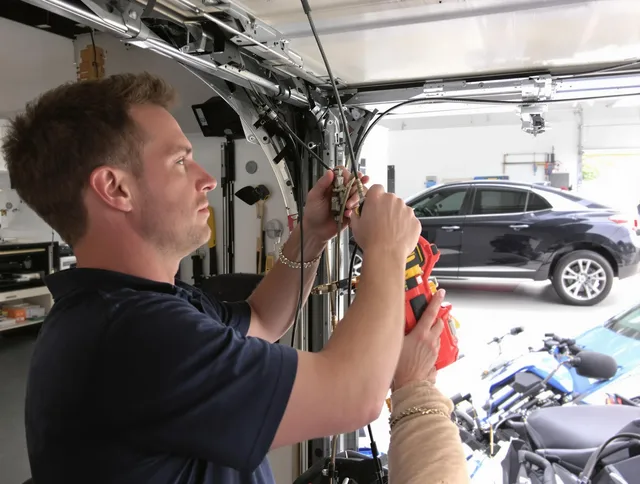 Westchester Garage Door Repair safety certified technician performing cable replacement in Westchester