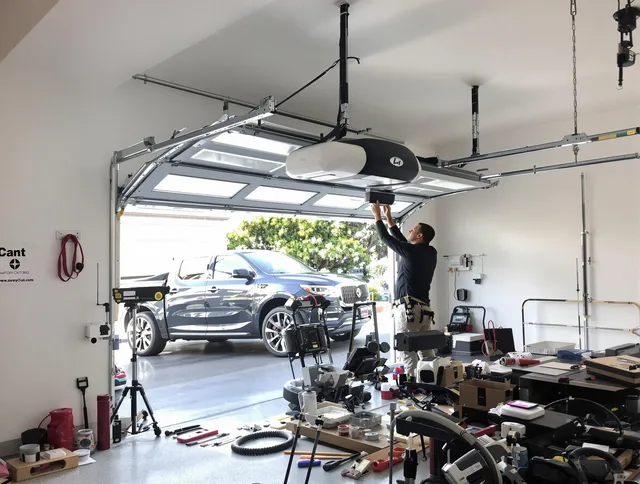Westchester Garage Door Repair specialist installing smart garage door opener system in Westchester home