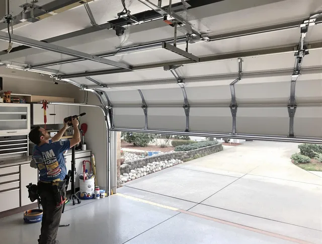 Garage door track repair service by Westchester Garage Door Repair in Westchester